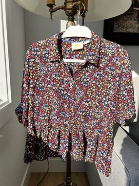 Anthropologie Maeve  Black Floral Button-Front Ruffle Hem Top